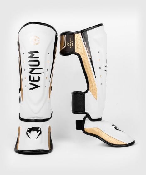 【15%OFF｜Mサイズ】VENUM Elite Evo シンガード｜本格派プロ仕様・耐久性・フィット感を追求（ホワイト・ゴールド）