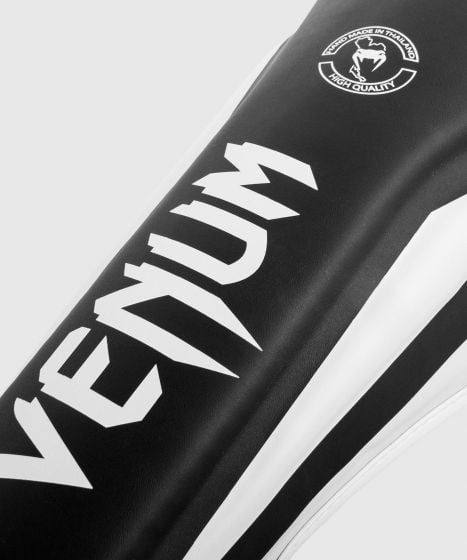 VENUM (ヴェナム/ベノム) エリートスタンドアップ シンガード レガース すねあて ブラック・ホワイト  UFC公式サプライヤー  高密度フォーム 2本マジックテープ(ベルクロ式)固定 トレーニング・スパーリング用 キックボクシング ムエタイ MMA 総合格闘技 空手