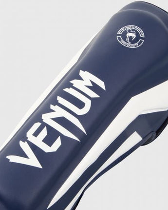 VENUM (ヴェナム/ベノム) エリートスタンドアップ シンガード レガース すねあて ホワイト・ネイビーブルー  UFC公式サプライヤー  高密度フォーム 2本マジックテープ(ベルクロ式)固定 トレーニング・スパーリング用 キックボクシング ムエタイ MMA 総合格闘技 空手